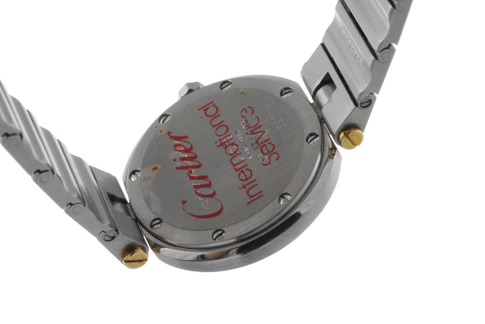 CARTIER - a Santos bracelet watch. Stainless steel case with yellow metal bezel. Numbered - Image 2 of 4