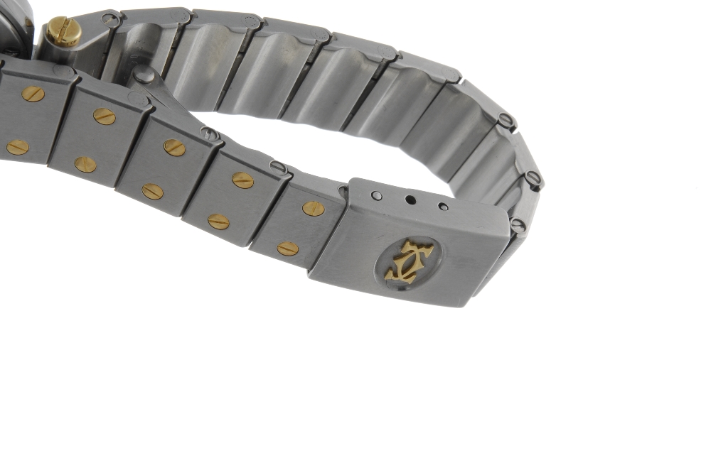 CARTIER - a Santos bracelet watch. Stainless steel case with yellow metal bezel. Numbered - Image 4 of 4