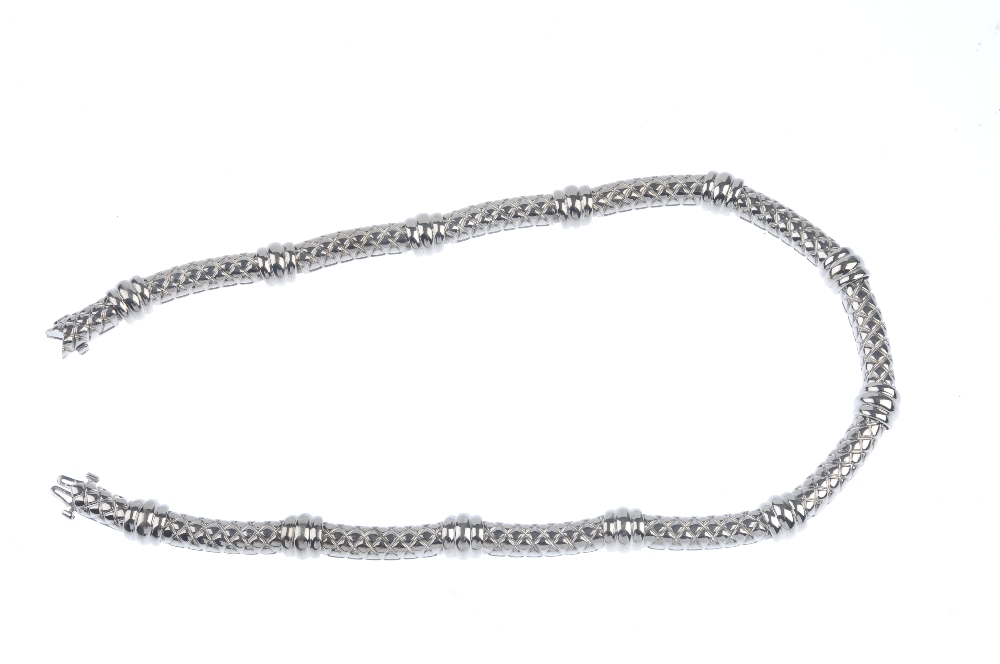 ASPREY & GARRARD - an 18ct gold collar. Designed as a series of curved bar links with lattice - Image 7 of 8