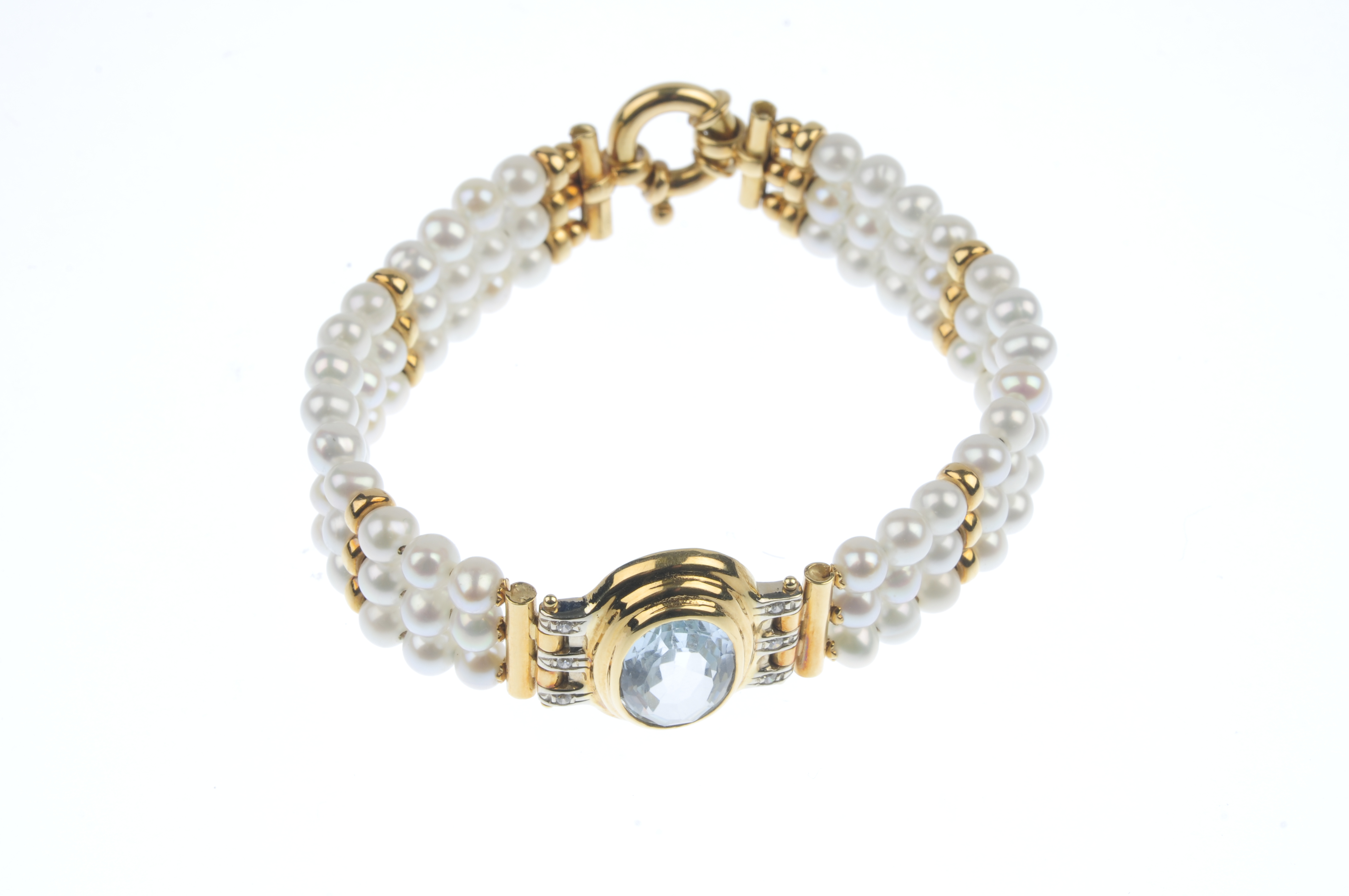 A topaz, diamond and cultured pearl bracelet. The oval-shape blue topaz, within a grooved surround - Image 2 of 4