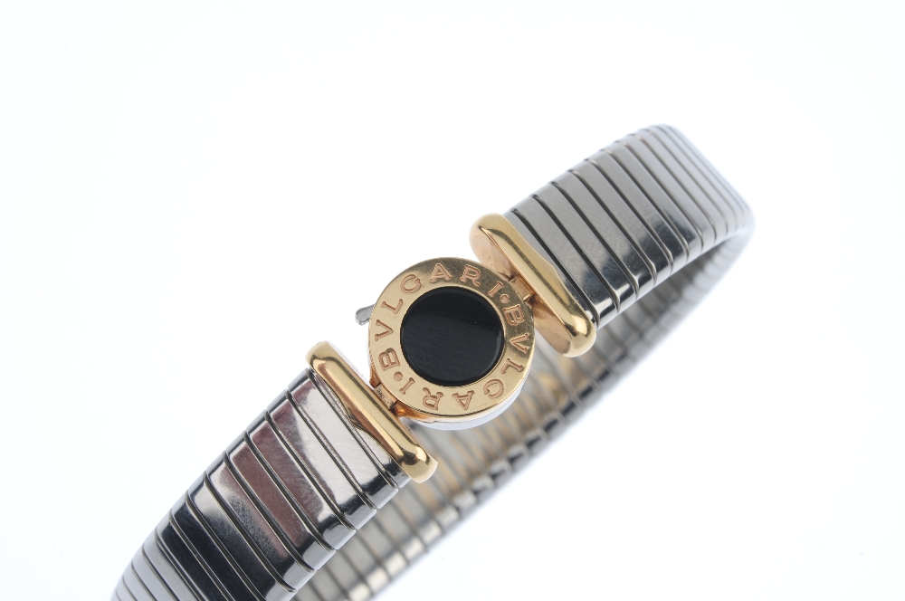 BULGARI - a steel and gold bracelet. Of bi-colour design, the flexible bracelet, to the circular - Image 5 of 6