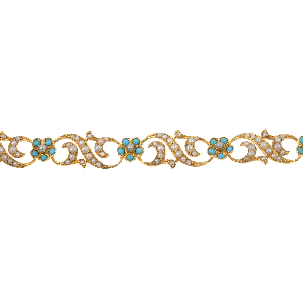An early 20th century 15ct gold turquoise and split pearl bracelet. Designed as a series of split
