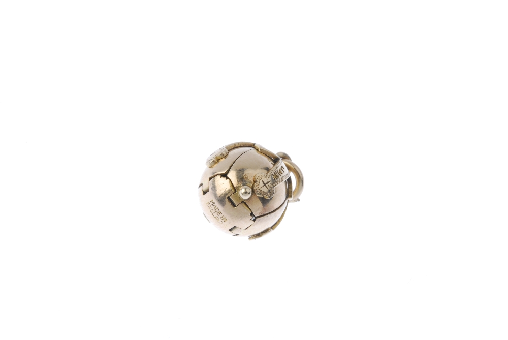 A Masonic ball pendant and garnet and diamond ring. The Masonic ball designed as a segmented - Image 8 of 8