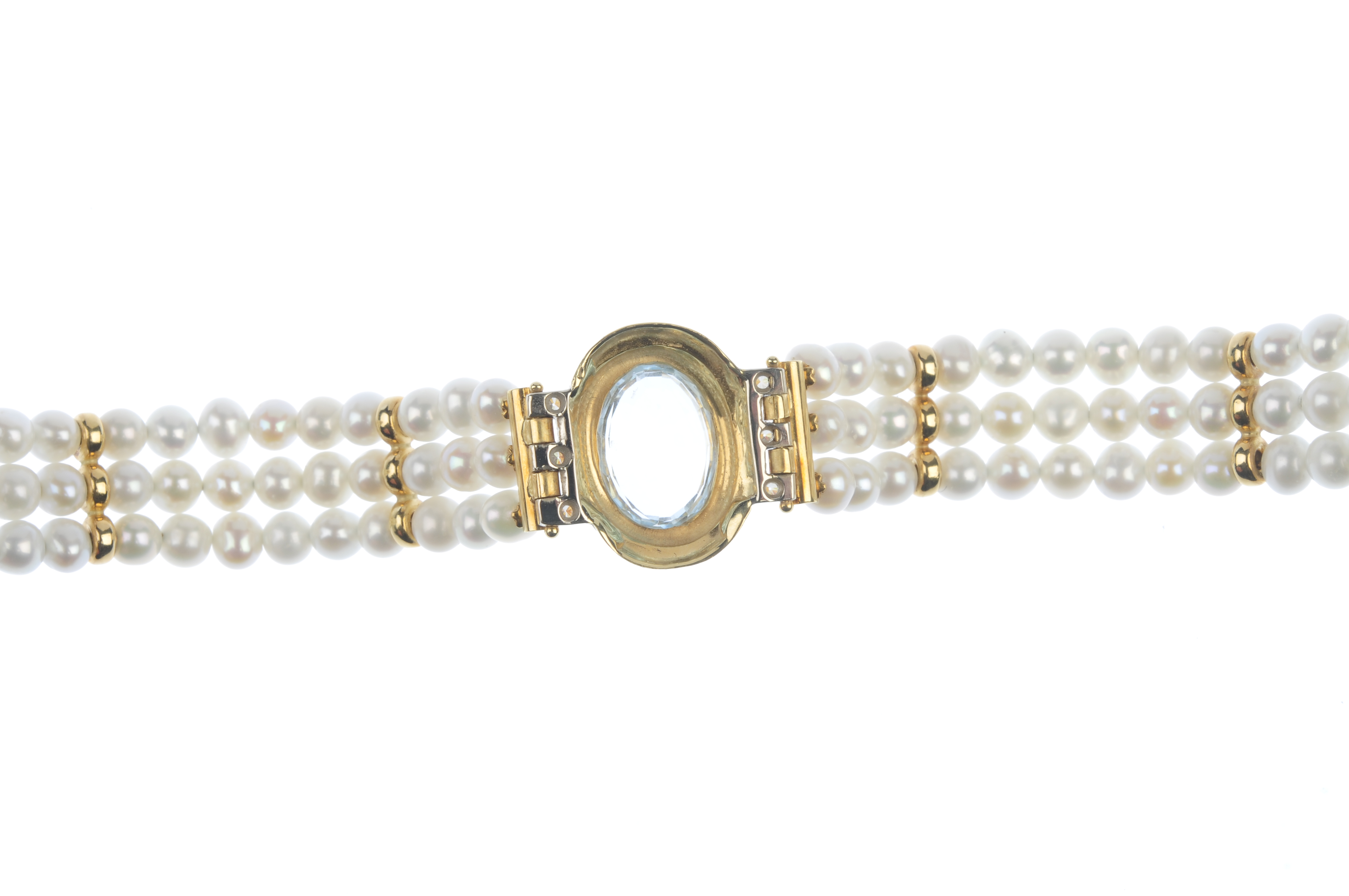A topaz, diamond and cultured pearl bracelet. The oval-shape blue topaz, within a grooved surround - Image 3 of 4