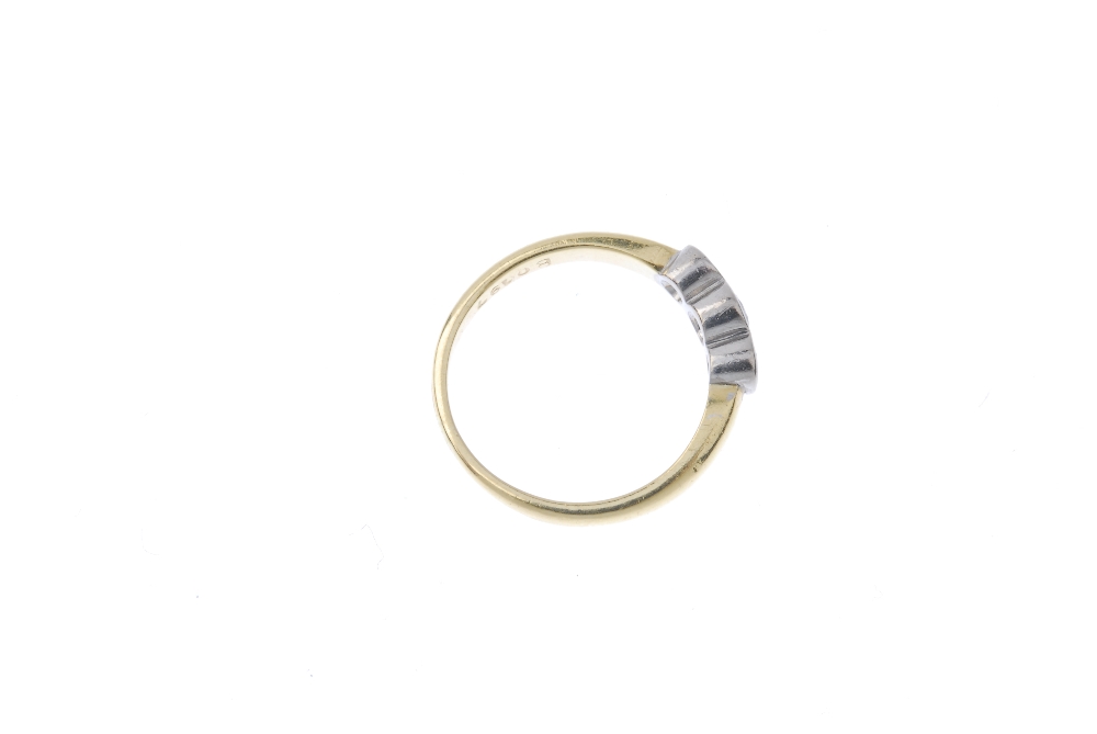 An 18ct gold diamond three-stone ring. Of bi-colour design, the graduated brilliant-cut diamond - Image 8 of 8
