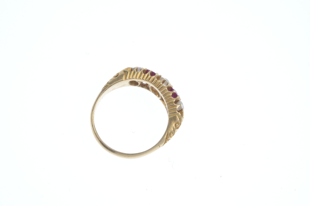 An early 20th century 18ct gold ruby and diamond five-stone ring. The alternating circular-shape - Image 3 of 3