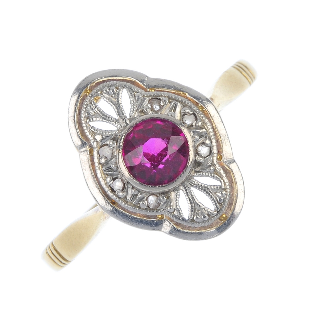 A mid 20th century gold and platinum synthetic ruby and diamond dress ring. The circular-shape