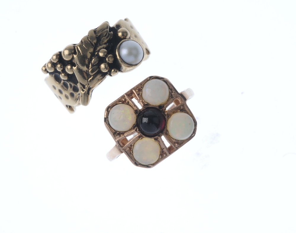 Two 9ct gold gem-set rings. The first designed as a circular garnet cabochon within a circular - Image 2 of 3