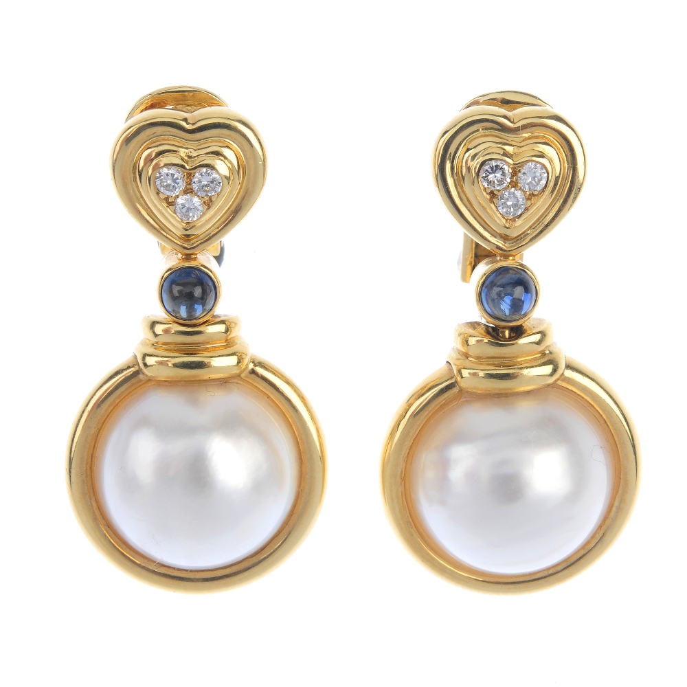 A pair of 18ct gold mabe pearl, diamond and sapphire ear pendants. Each designed as a mabe pearl