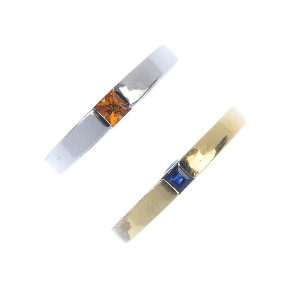Two gem-set rings. Each designed as a square-shape citrine or sapphire cabochon, inset to the