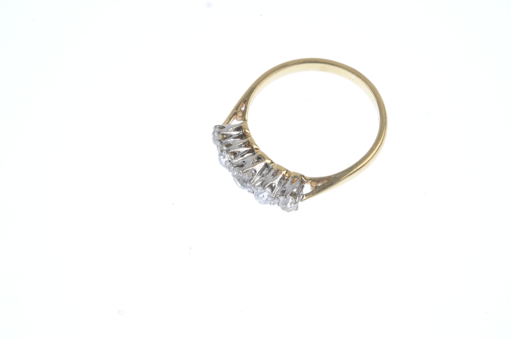 A mid 20th century 18ct gold diamond five-stone ring. The graduated old-cut diamond line, to the - Image 2 of 4