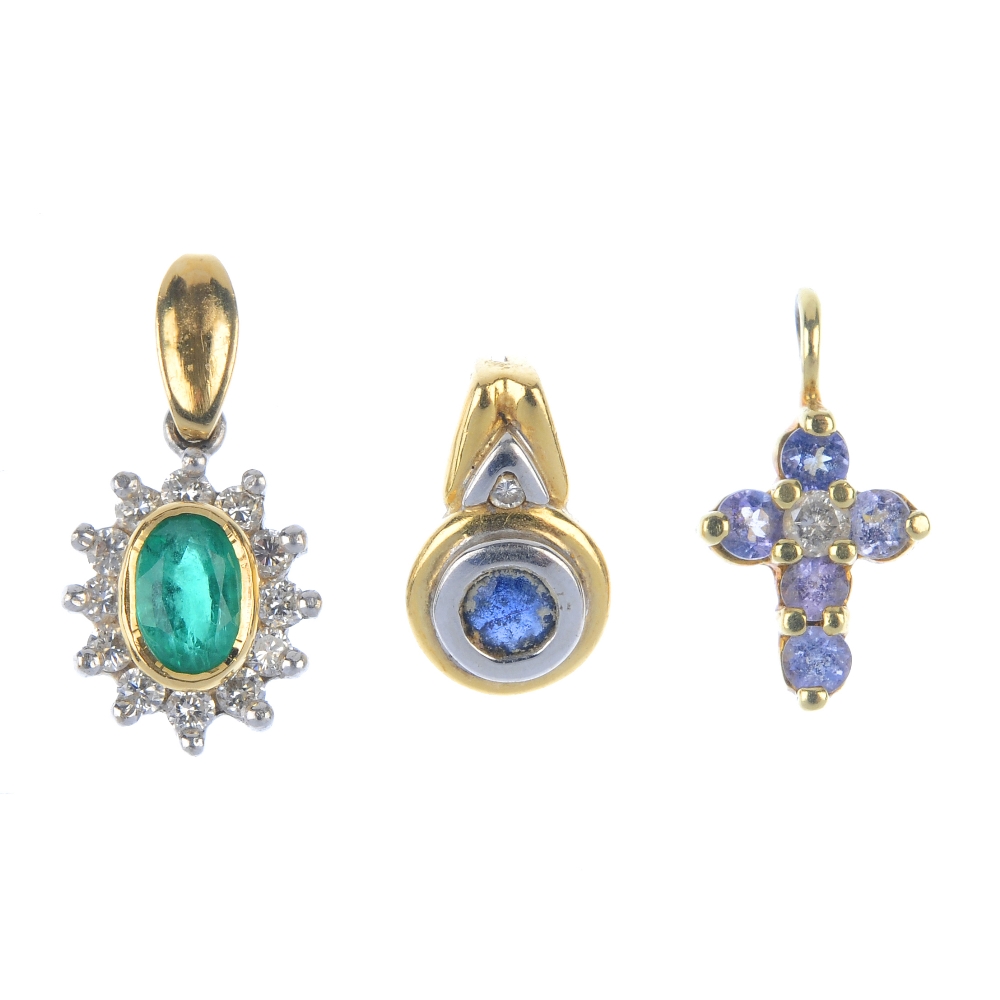 A selection of three diamond and gem-set pendants. To include an 18ct gold emerald and diamond