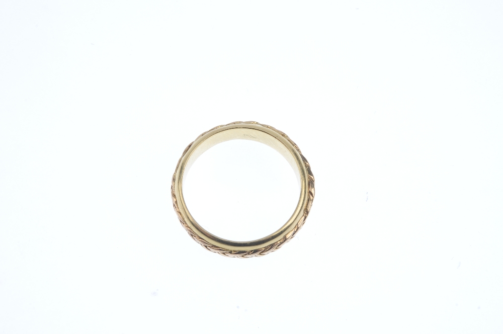 CLOGAU - an 18ct gold band ring. The plain band, with stylised knot motif. Maker's marks for Clogau. - Image 2 of 2