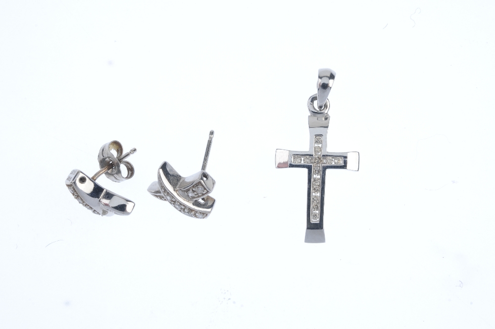 A selection of diamond jewellery. To include a pair of cross ear studs, a 9ct gold cross pendant, - Image 2 of 3