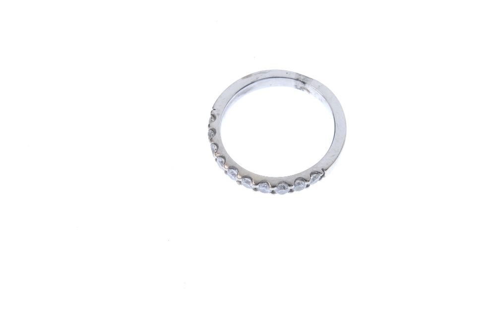 A diamond half-circle eternity ring. The brilliant-cut diamond line, to the plain half-band. - Image 2 of 4