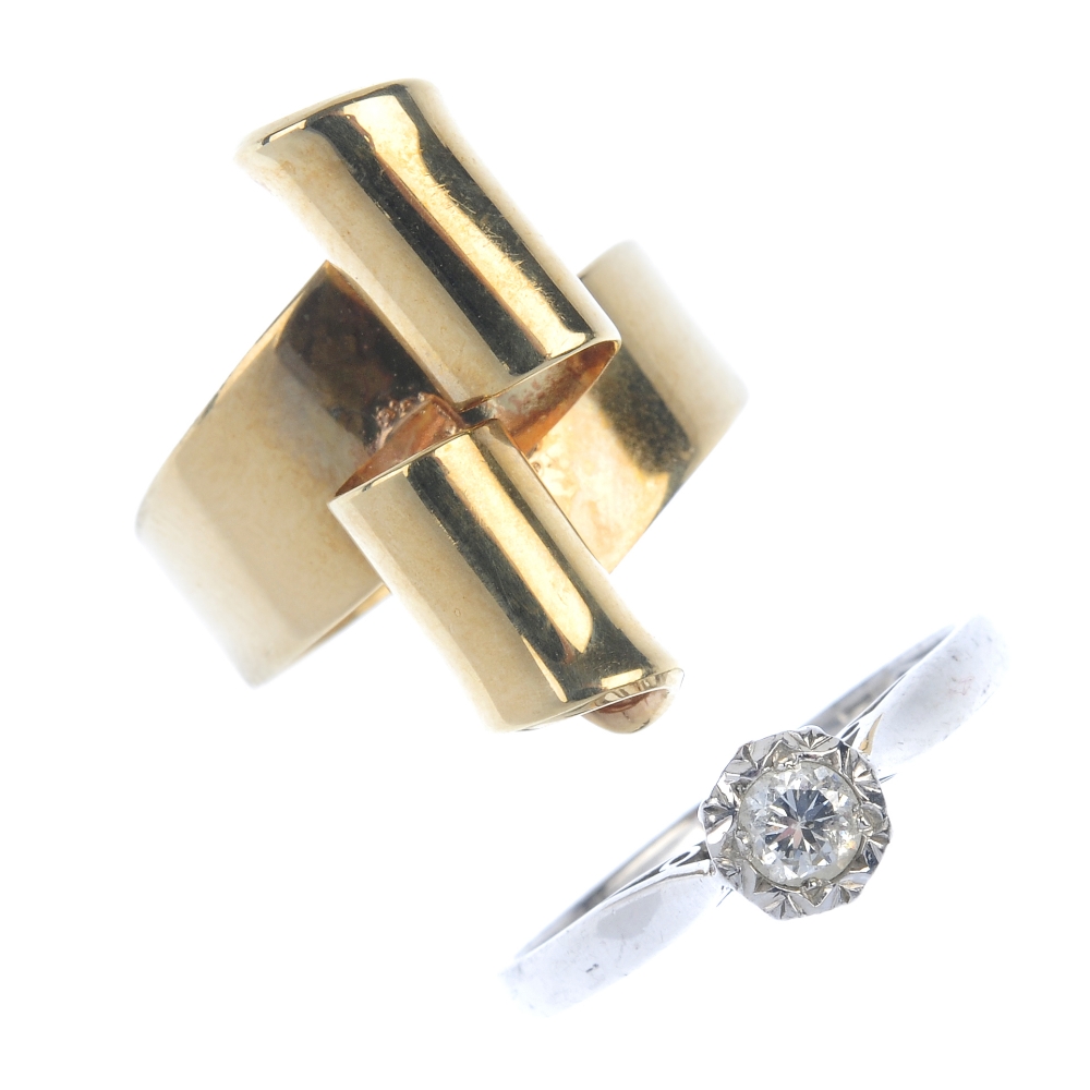 A selection of three 9ct gold rings. To include a brilliant-cut diamond single-stone ring, a