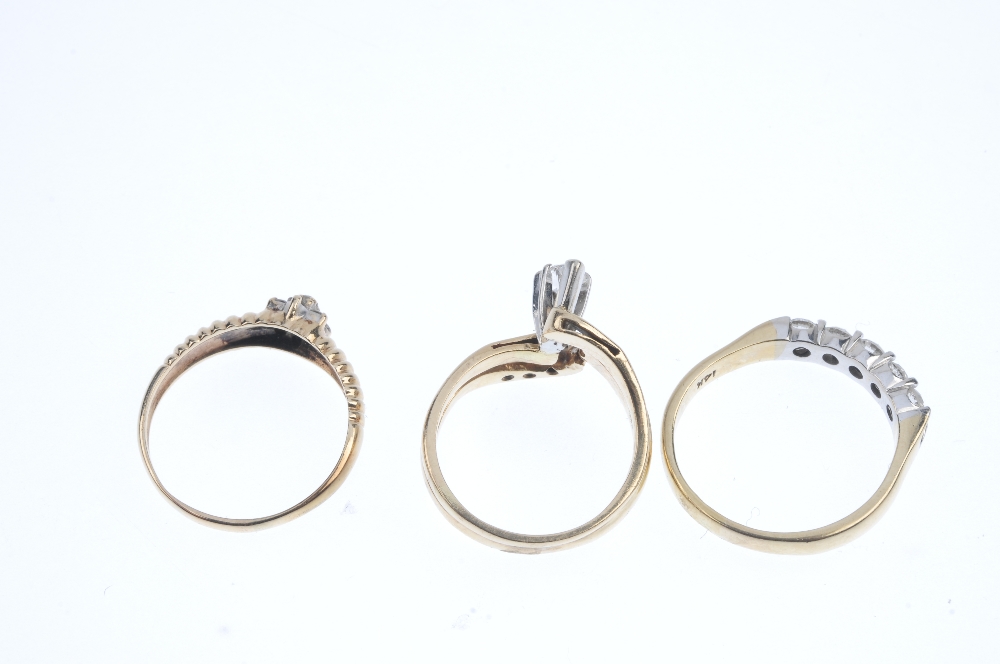A selection of three diamond rings. To include a marquise-shape diamond ring with diamond curved - Image 3 of 3