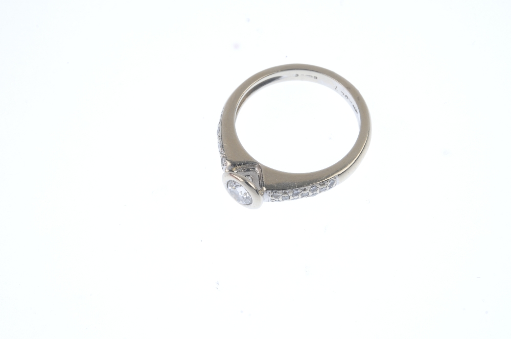 An 18ct gold diamond single-stone ring. The brilliant-cut diamond collet, to the pave-set diamond - Image 2 of 4