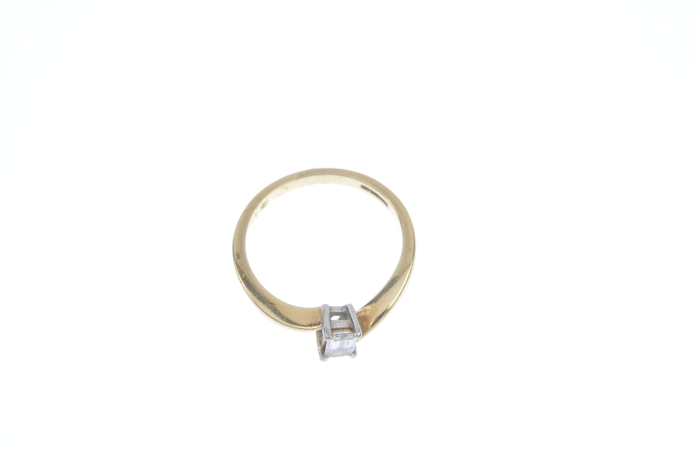 An 18ct gold diamond single-stone ring. The rectangular-shape diamond, to the asymmetric shoulders - Image 2 of 3