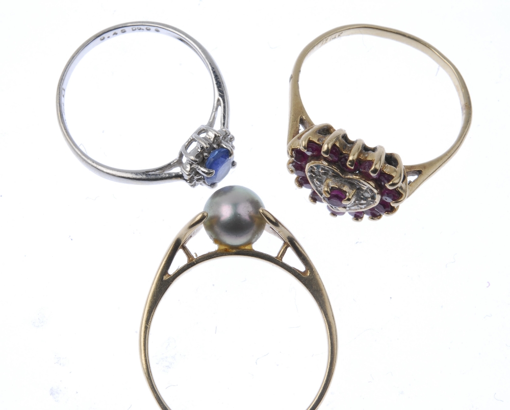 A selection of three diamond and gem-set rings. To include a sapphire and diamond cluster ring, a - Image 2 of 2