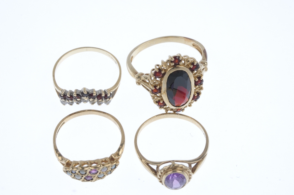 A selection of four 9ct gold gem-set dress rings. To include an oval-shape amethyst single-stone - Image 2 of 3