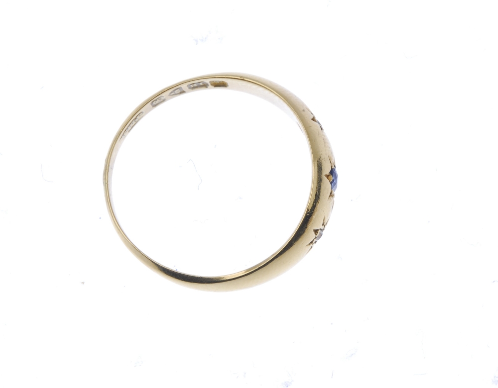 An Edwardian 18ct gold sapphire and diamond ring. The oval-shape sapphire and single-cut diamond - Image 2 of 2