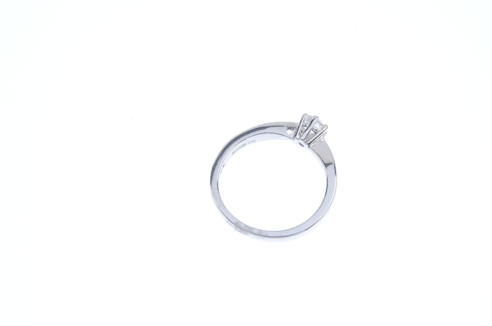 An 18ct gold diamond single-stone ring. The brilliant-cut diamond, to the tapered shoulders and - Image 3 of 3