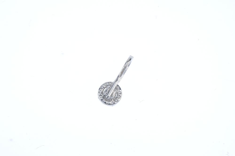 An 18ct gold diamond pendant. The brilliant-cut diamond, raised to the similarly-cut diamond - Image 2 of 2