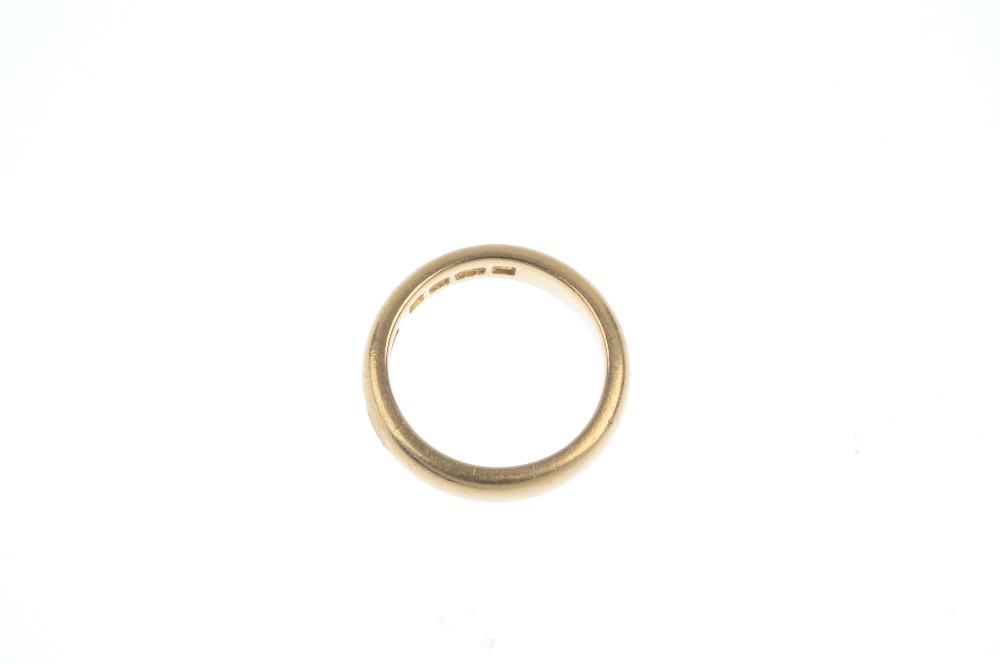 A 22ct gold band ring. Hallmarks for London, 1924. Weight 7.3gms. For any specific questions or - Image 2 of 2