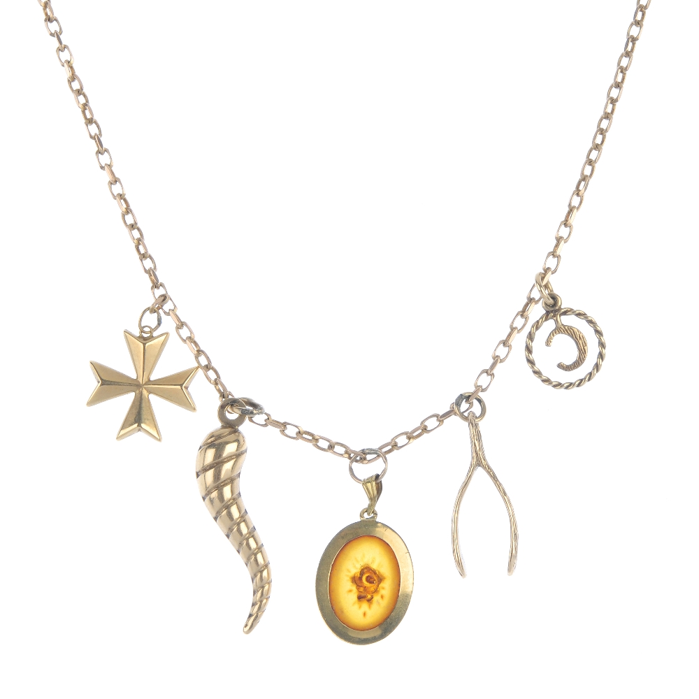 A 9ct gold necklace. The curb-link chain, suspending five charms, to include a wishbone and cross,