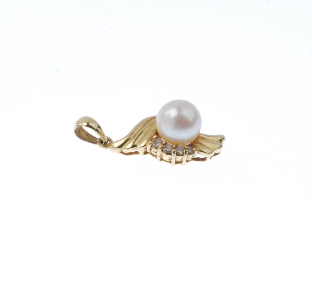 (174110) A cultured pearl and diamond pendant. Estimated total diamond weight 0.09ct. Length 2.5cms. - Image 2 of 3