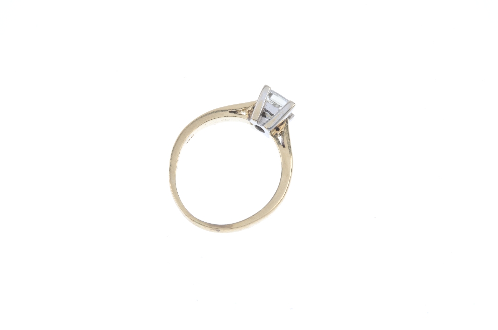 A diamond single-stone ring. The square-shape diamond, to the tapered shoulders and plain band. - Image 3 of 3