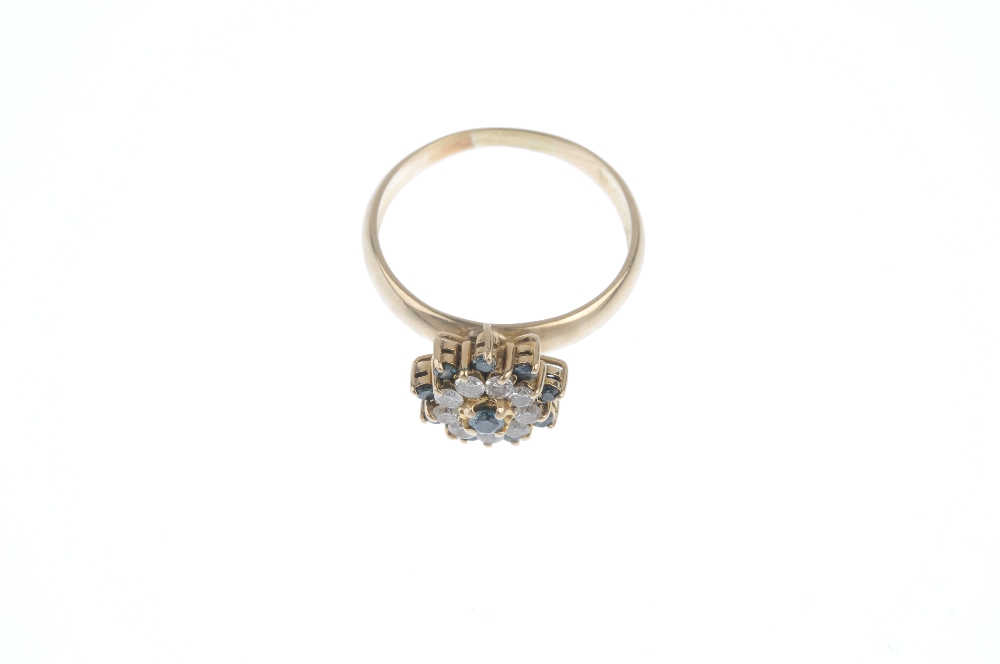 A diamond and colour treated diamond cluster ring. The brilliant-cut colour treated 'blue' - Image 2 of 3