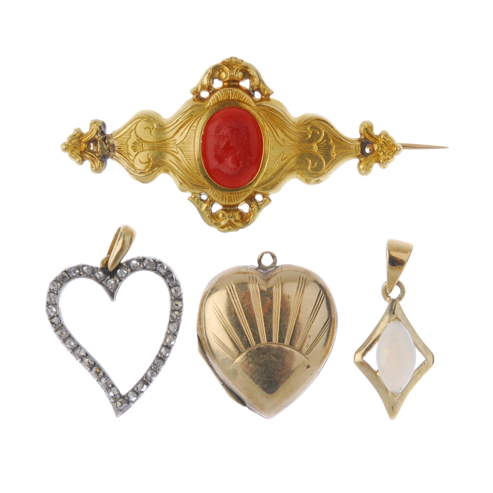 A selection of jewellery. To include a rose-cut diamond heart pendant, a red paste pendant, an