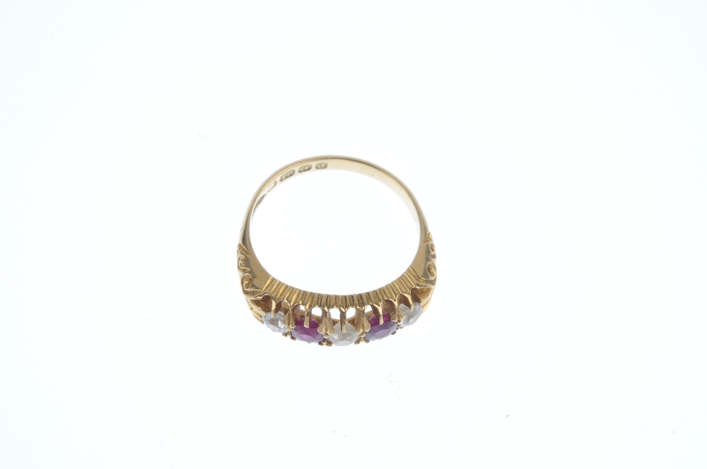 An early 20th century 18ct gold ruby and diamond five-stone ring. The alternating circular-shape - Image 2 of 3