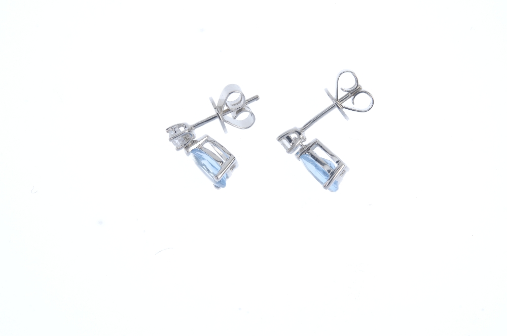 A pair of 18ct gold aquamarine and diamond earrings. Each designed as a pear-shape aquamarine, - Image 2 of 2