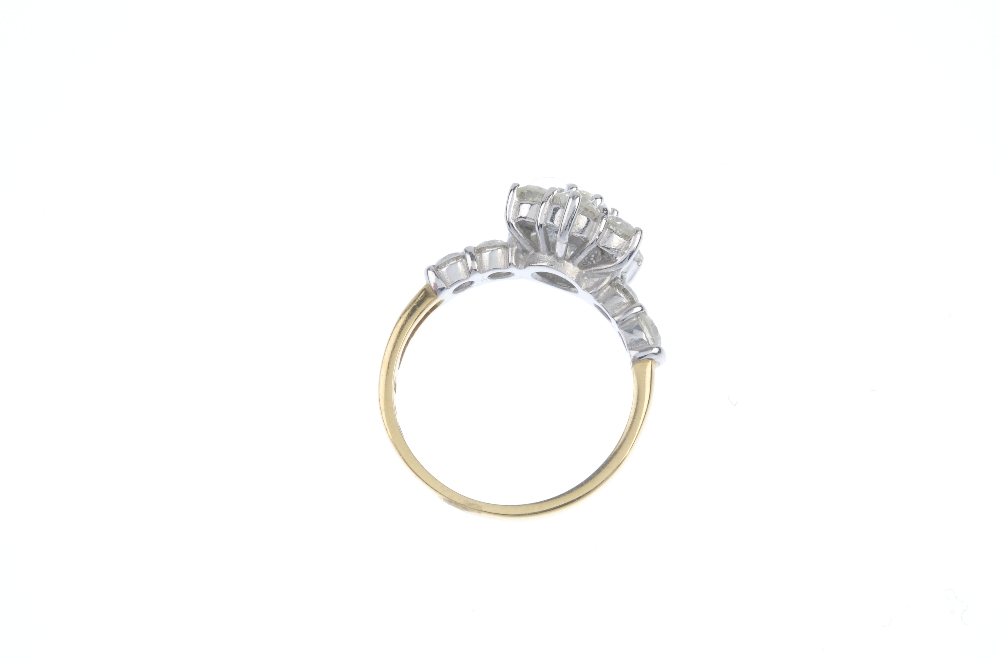 An 18ct gold diamond cluster ring. The brilliant-cut diamond floral cluster, to the similarly-cut - Image 3 of 3