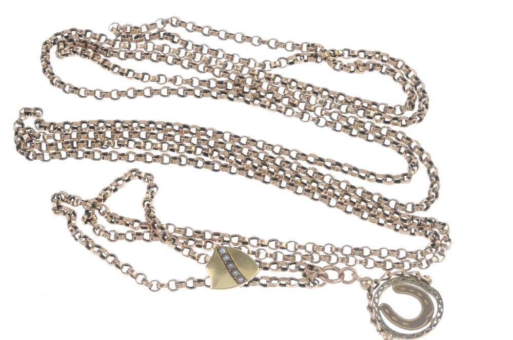A mid 20th century longuard chain with fob and slider. The trace-link chain, with openwork horseshoe - Image 2 of 2