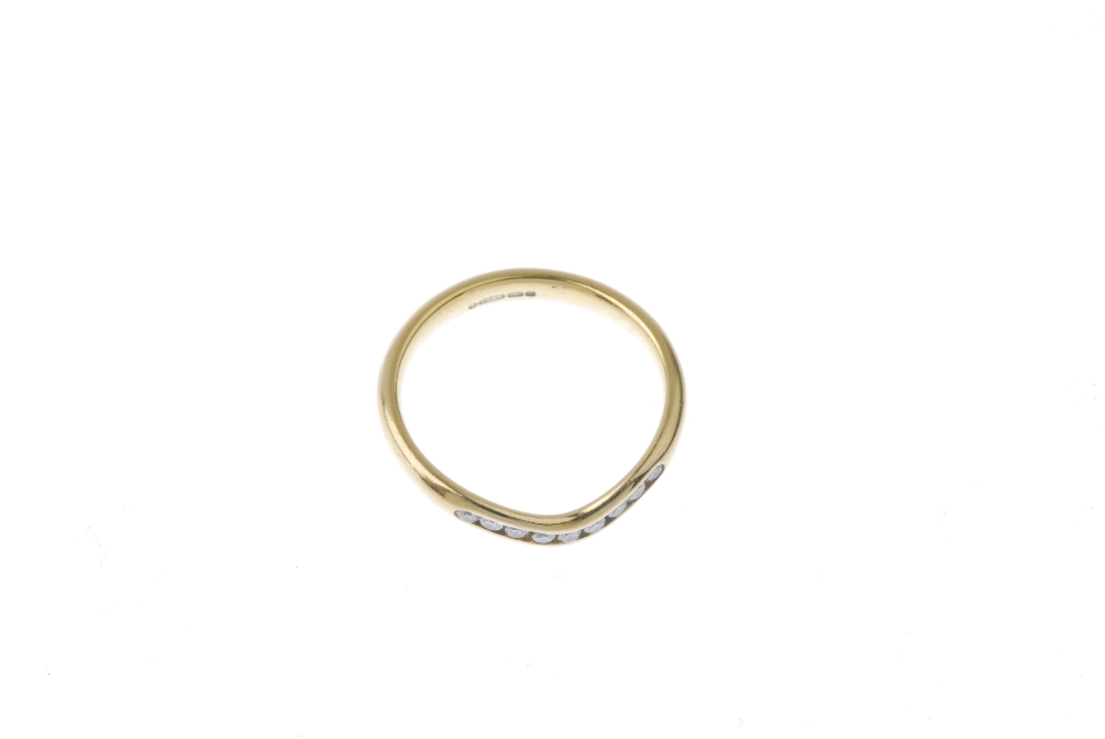 An 18ct gold diamond half-circle eternity ring. Designed as a channel-set brilliant-cut diamond - Image 2 of 4