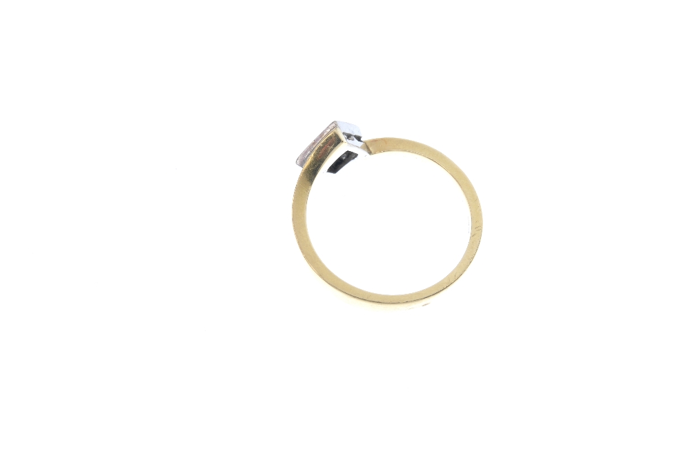 An 18ct gold diamond four-stone ring. The square-shape diamond panel, with crossover shoulders and - Image 4 of 4