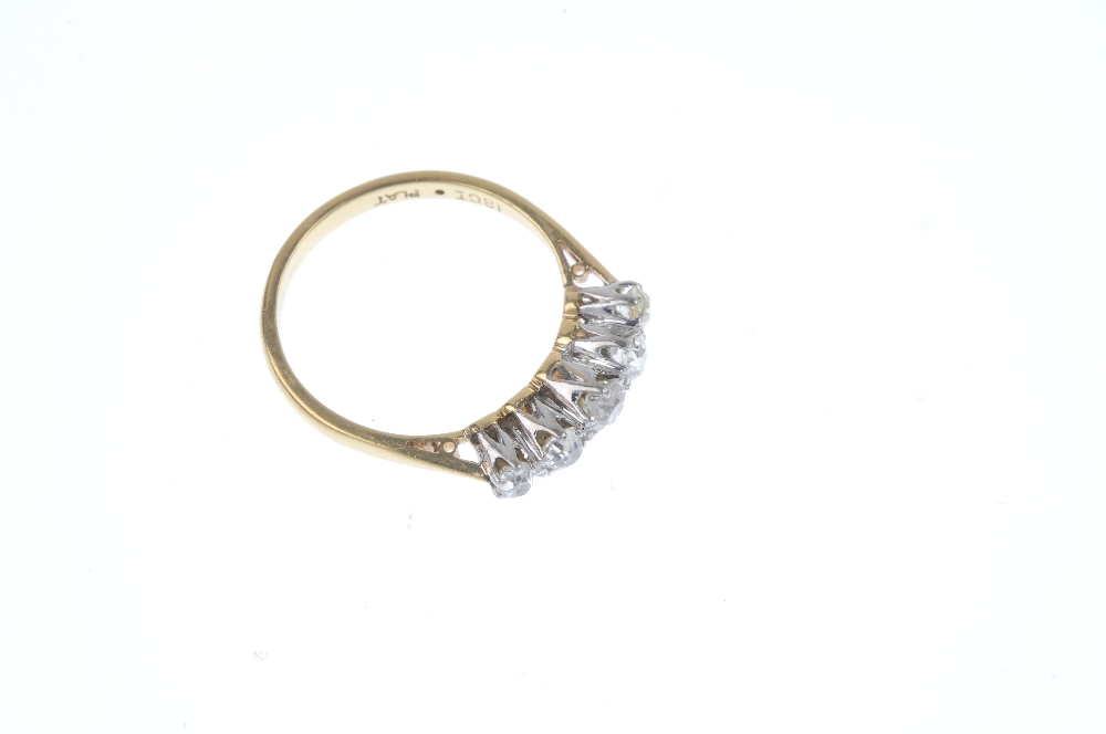 A mid 20th century 18ct gold diamond five-stone ring. The graduated old-cut diamond line, to the - Image 3 of 4