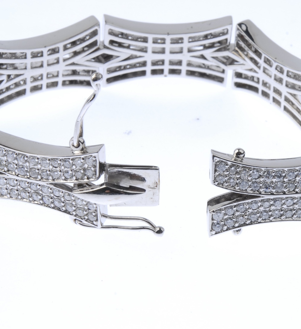 (128988) A diamond fancy-link bracelet. Designed as a series of pave-set diamond curved links, to - Image 4 of 4