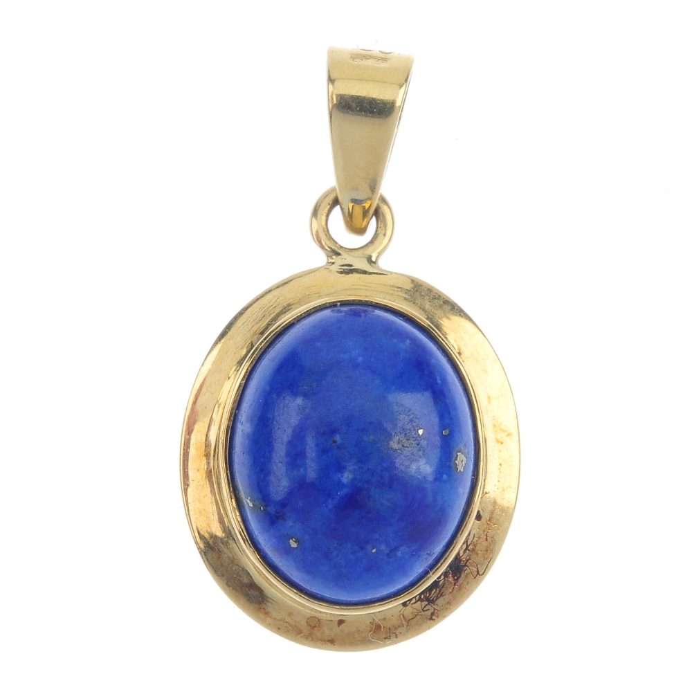 A pair of dyed lapis lazuli earrings and pendant set. The earrings each designed as an oval-shape