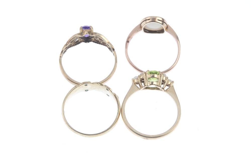 A selection of four 9ct gold gem-set rings. To include an early 20th century oval opal cabochon - Image 3 of 3
