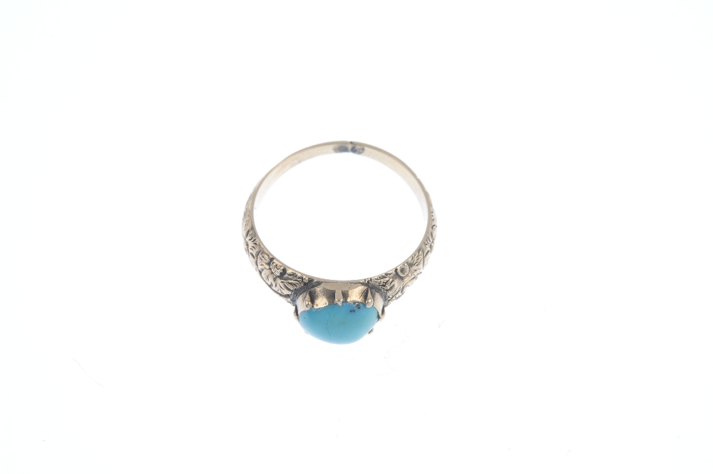 An early to mid 19th century gold turquoise single-stone ring. The oval turquoise cabochon, to the - Image 2 of 3