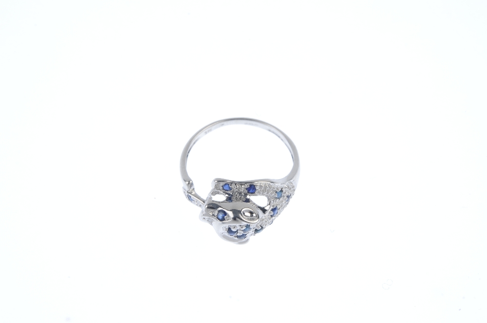 A 9ct gold sapphire and diamond leopard ring. Set with circular-shape sapphire and a single-cut - Image 2 of 3