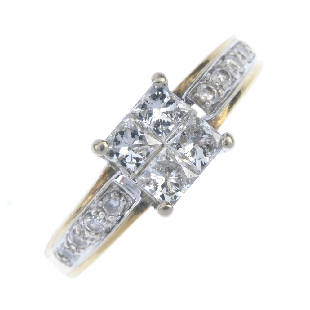 An 18ct gold diamond dress ring. The square-shape diamond panel, with brilliant-cut diamond line
