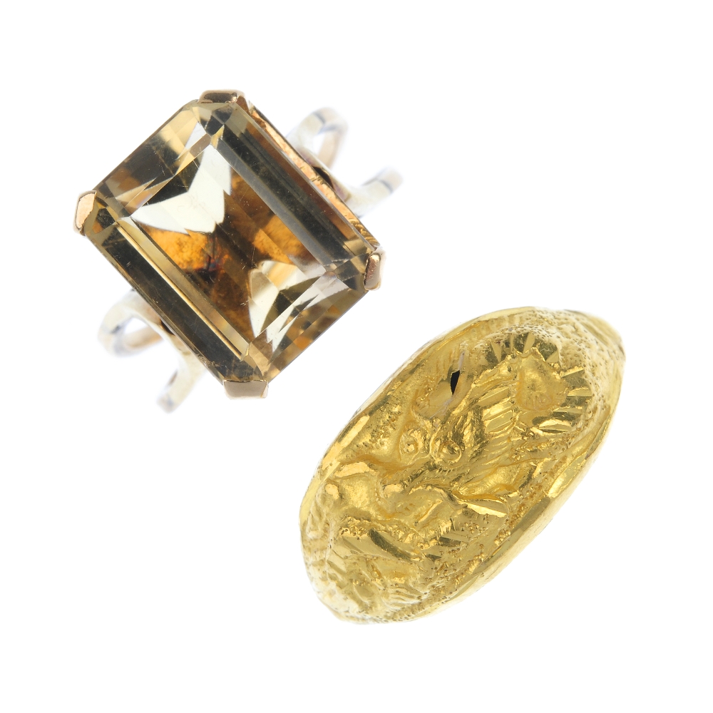 Two dress rings. To include a rectangular-shape citrine single-stone ring with bifurcated band,