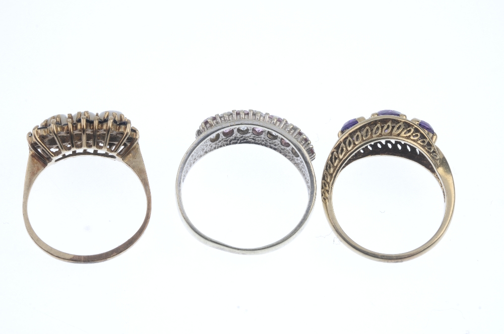 A selection of three gem-set dress rings. To include an amethyst three-stone ring, a 9ct gold oval - Image 3 of 3