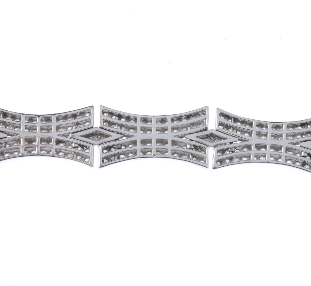 (128988) A diamond fancy-link bracelet. Designed as a series of pave-set diamond curved links, to - Image 2 of 4